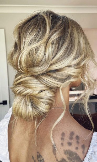 Stunning Updos For Any Occasion In Tousled Low Bun