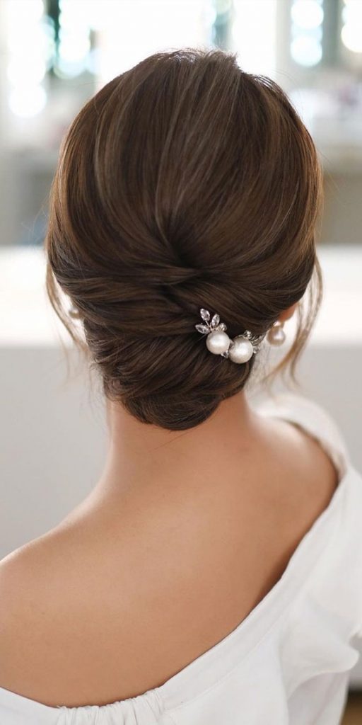 53 Best Wedding Hairstyles For 2023 Brides Brunette Low Updo