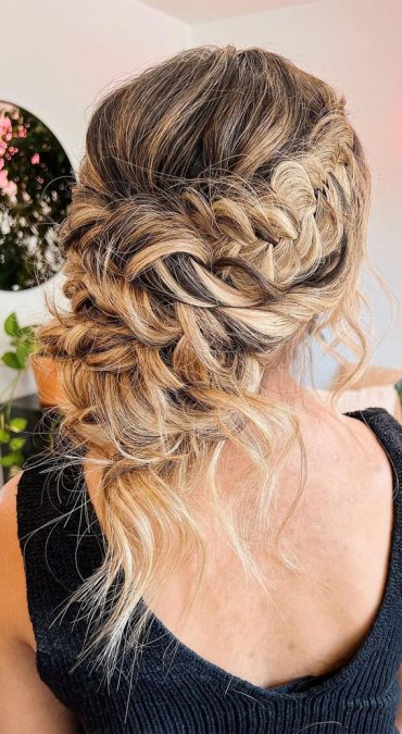 50 Updo Hairstyles That Re So Stylish Braided Loose Low Bun With Texture