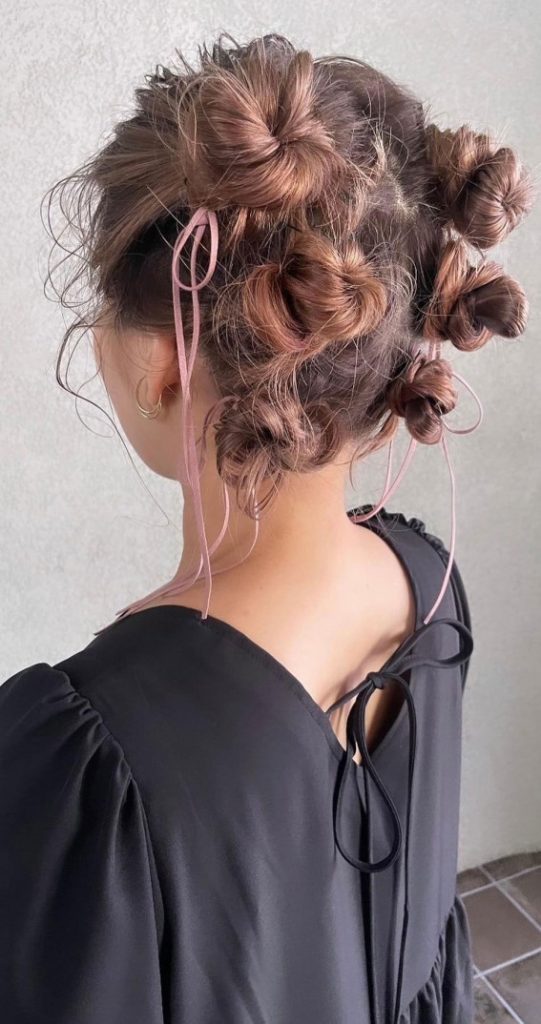 A Trendy Collection Of Hairstyles Adorned With Chic Bows Bow Topped