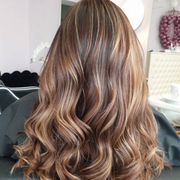 Caramel Blonde Highlights On Wavy Layered Brown Hair