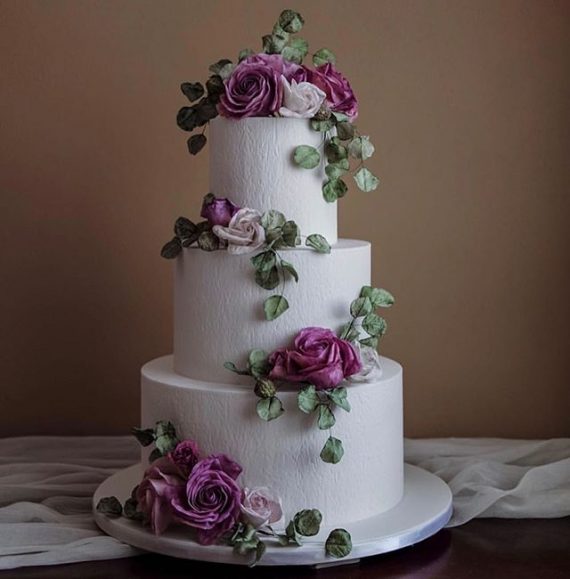 Mauve Toned Three Tier Wedding Cake With Purple Sugar On 