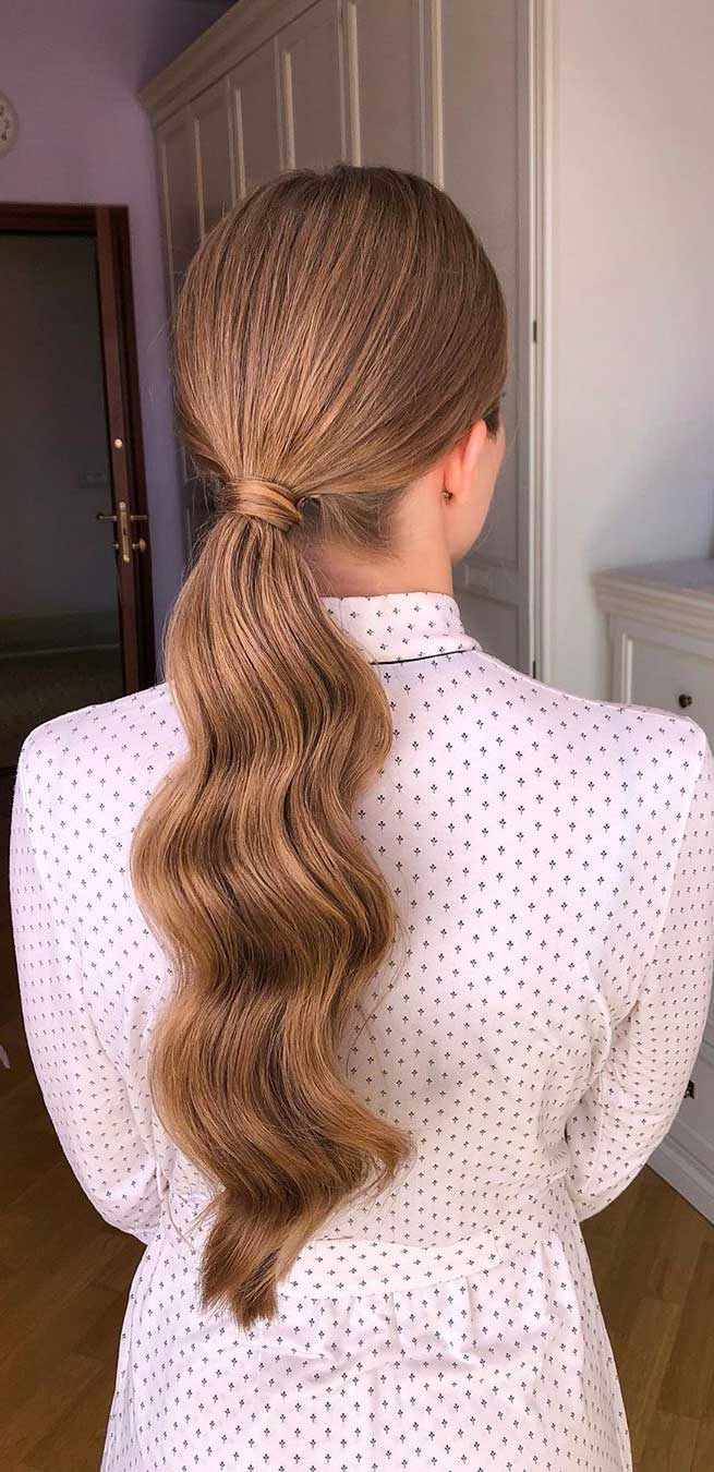 Sleek Low Bun with a Side Part. Perfect for any occasion. Stylist: hai... |  TikTok