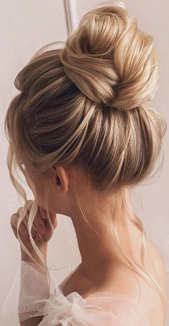 50+ Classic Wedding Hairstyles That Never Go Out of Style : Donut Top Knot  with Bangs