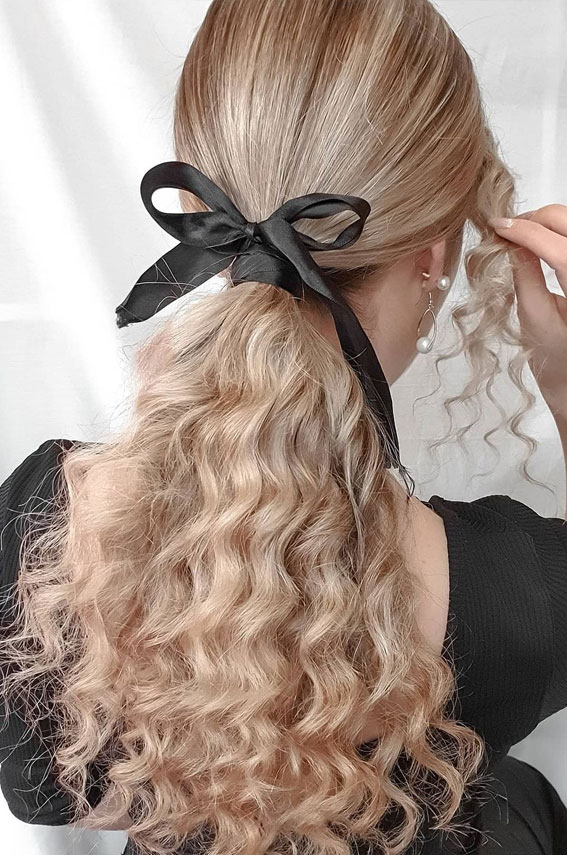 High And Low Ponytails For Any Occasion Simple Pony With Black Bow