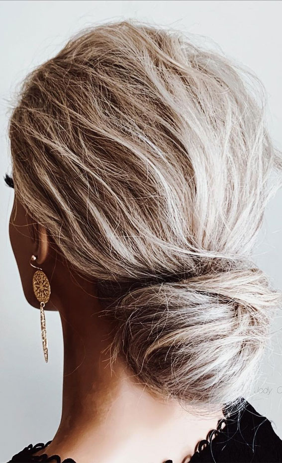 54 Cute Updo Hairstyles That Are Trendy for 2021 : Low elegant textured bun