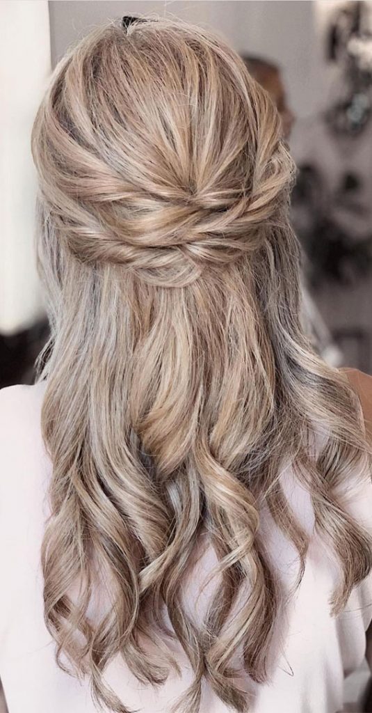 Half Up Hairstyles That Are Pretty For 2021 : Twisted and Tuck half up