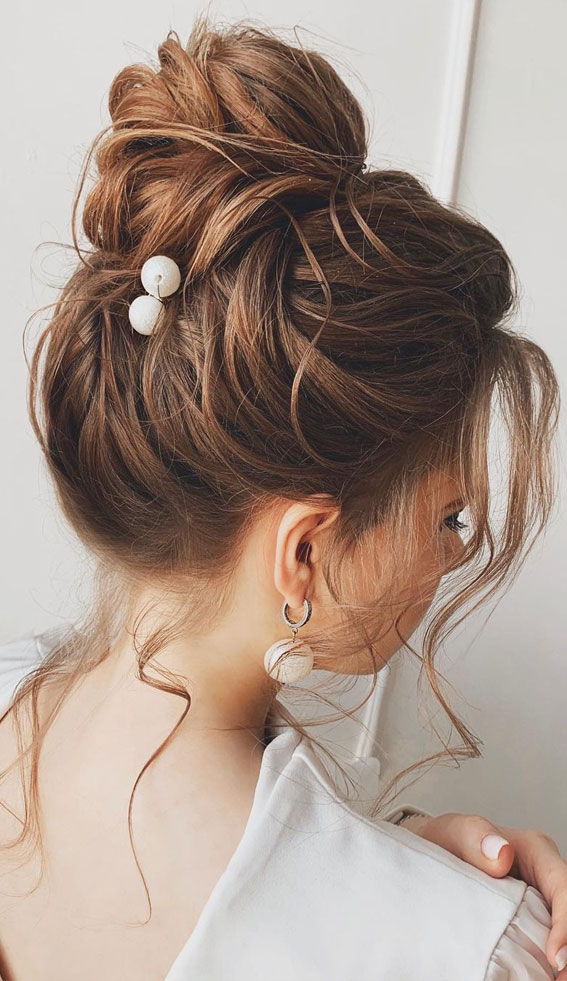 Updo Hairstyles For Your Stylish Looks In 2021 : Brunette textured high bun