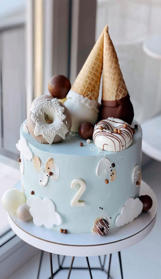 Pretty cake decorating designs we’ve bookmarked : Soft Blue Birthday Cake For 2nd Birthday