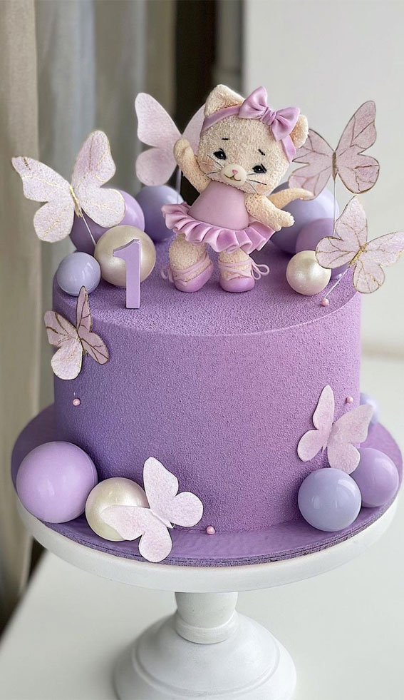 Pretty cake decorating designs we’ve bookmarked : 1st birthday soft purple cake