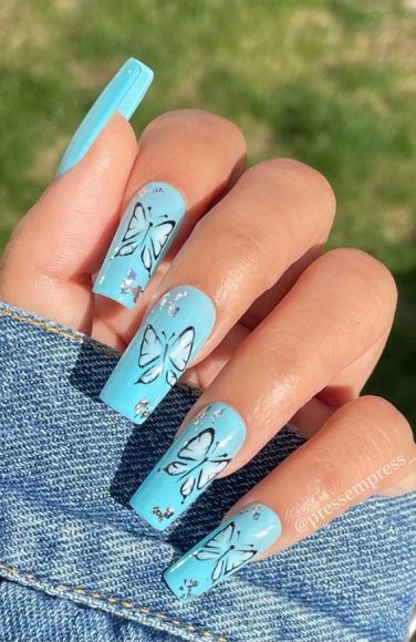 Summer nail art ideas to rock in 2021 : blue nails with butterfly