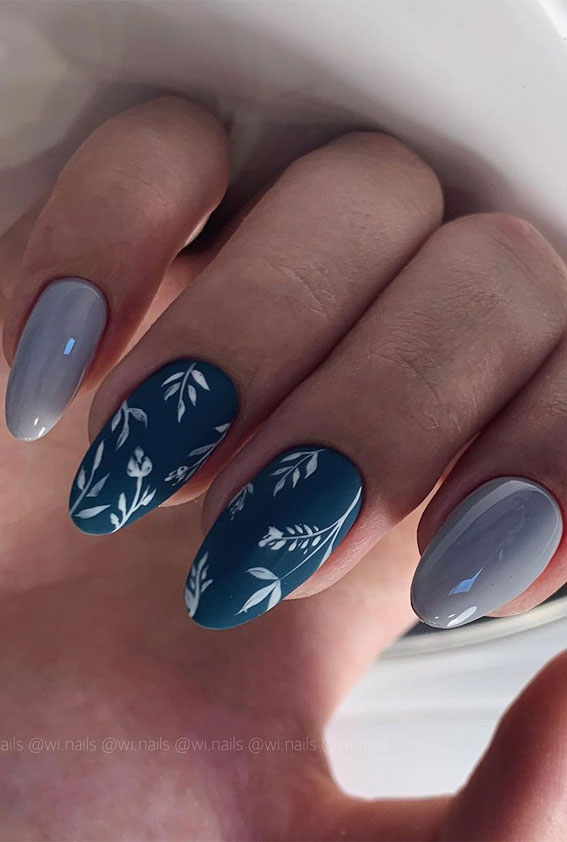 Gorgeous Nail Designs to Celebrate the Season : Leaf on dark blue nails