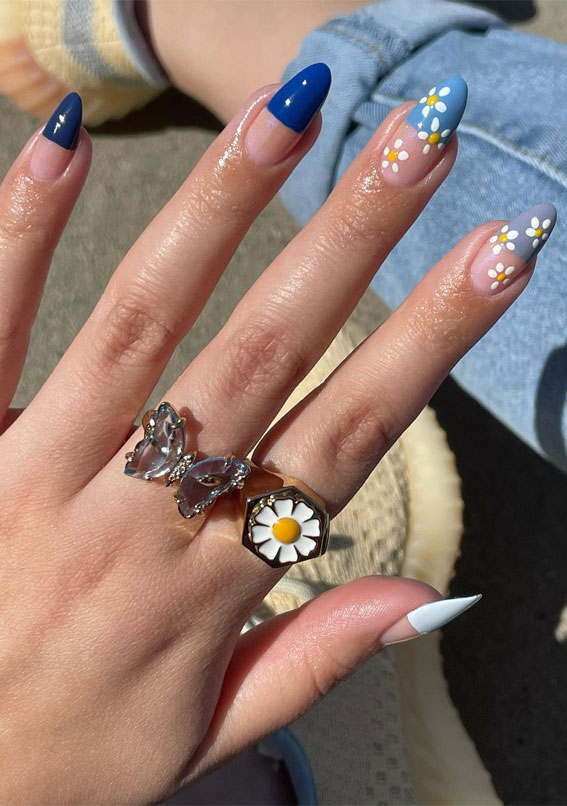 Summer nail art ideas to rock in 2021 : Blue Modern French Tips with Daisy Accents