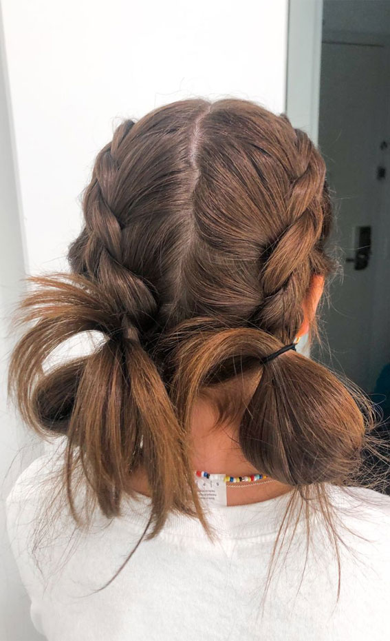 Image of Messy bun hairstyle for school girls