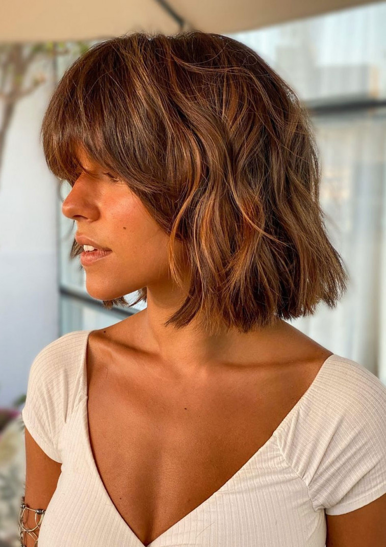 Image of Long blunt bob with curly curtain bangs
