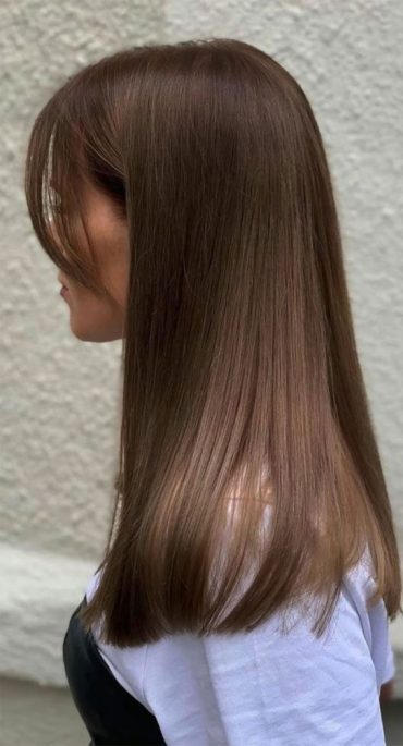 50 Stylish Brown Hair Colors And Styles For 2022 Medium Warm Brown With Curtain Bangs 