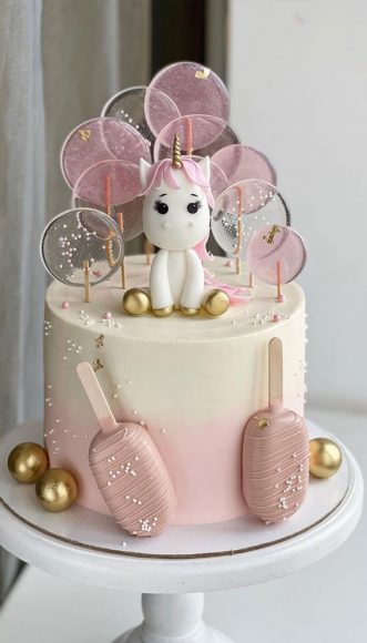 25 Baby Girl First Birthday Cake Ideas : Ombre Pink Cake Topped with ...