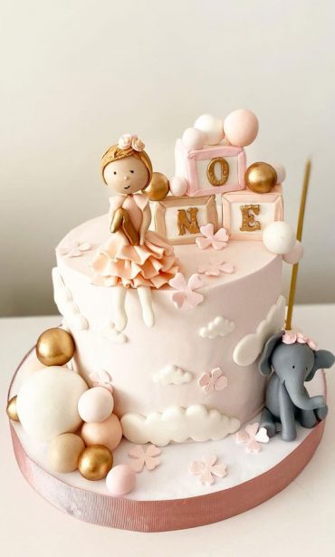 25 Baby Girl First Birthday Cake Ideas : Soft Pink Cake Topped with ...