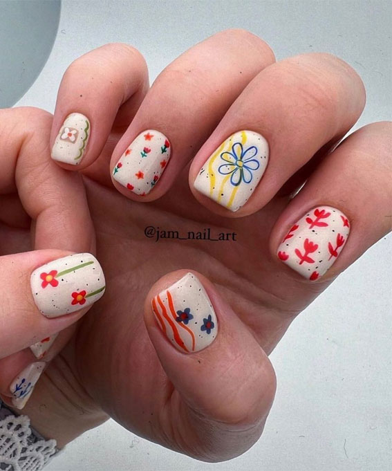 35 Fresh & Colourful Spring Nail Designs : Flower on Speckled Short Nails
