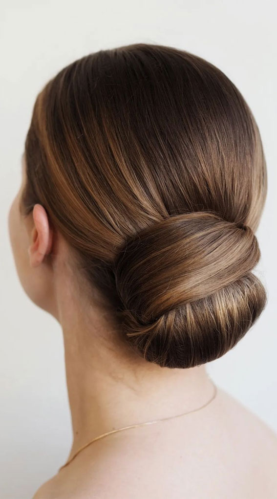 50 Stunning Updos For Any Occasion in 2022 : Sleek Wrapped Low Bun