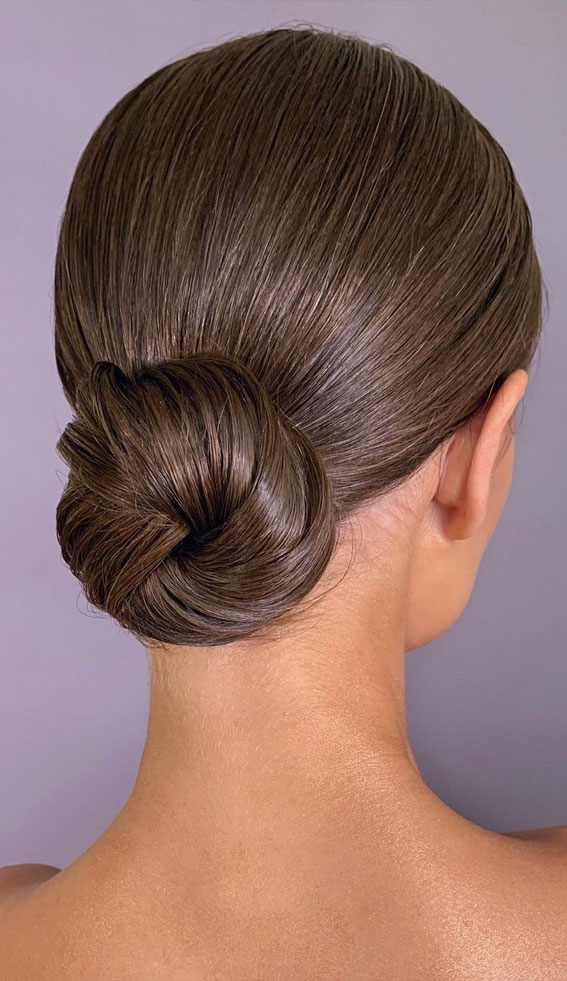 50 Stunning Updos For Any Occasion in 2022 : Simple Low Bun for Brunette