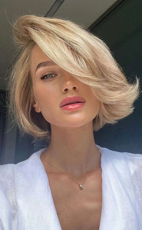 50 Different Haircuts for Women : Side Part Blonde Modern Bob