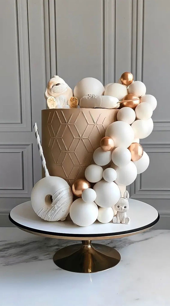 70 Cake Ideas for Birthday & Any Celebration : Gold Cake Adorned with Cascading Gold & White Balloons