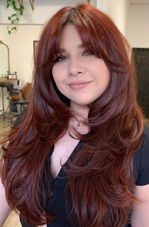 40 Copper Hair Color Ideas That’re Perfect for Fall : Cinnamon Copper Wispy Bangs + Layered Cut