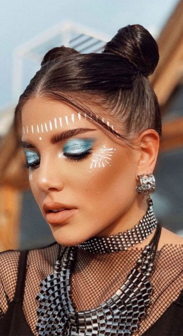 25 Awesome Tribal Makeup Ideas : High Bun + Braids + Tribal Makeup