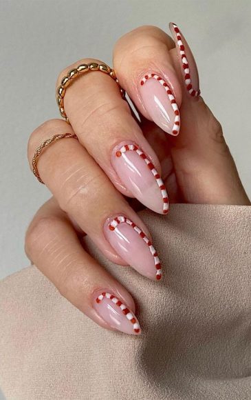 50 Stylish Festive Nail Designs Minimalist Candy Cane Sheer Nails 1246