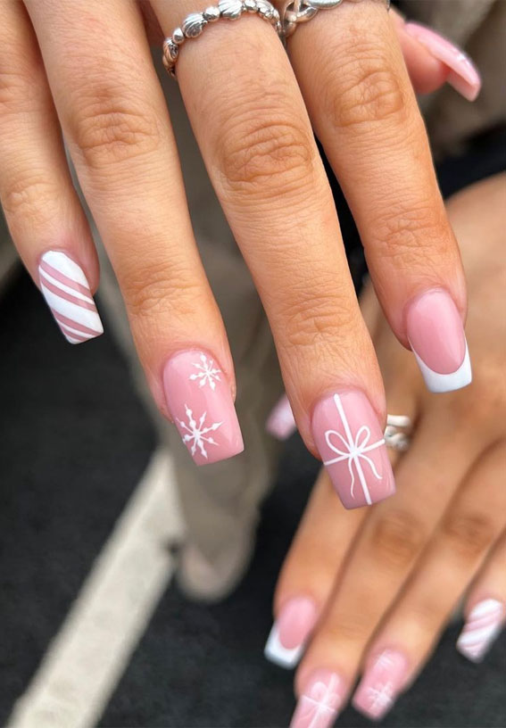 45 Beautiful Festive Nails To Merry The Season : Clear Pink Nails with White Tip + Snowflake 