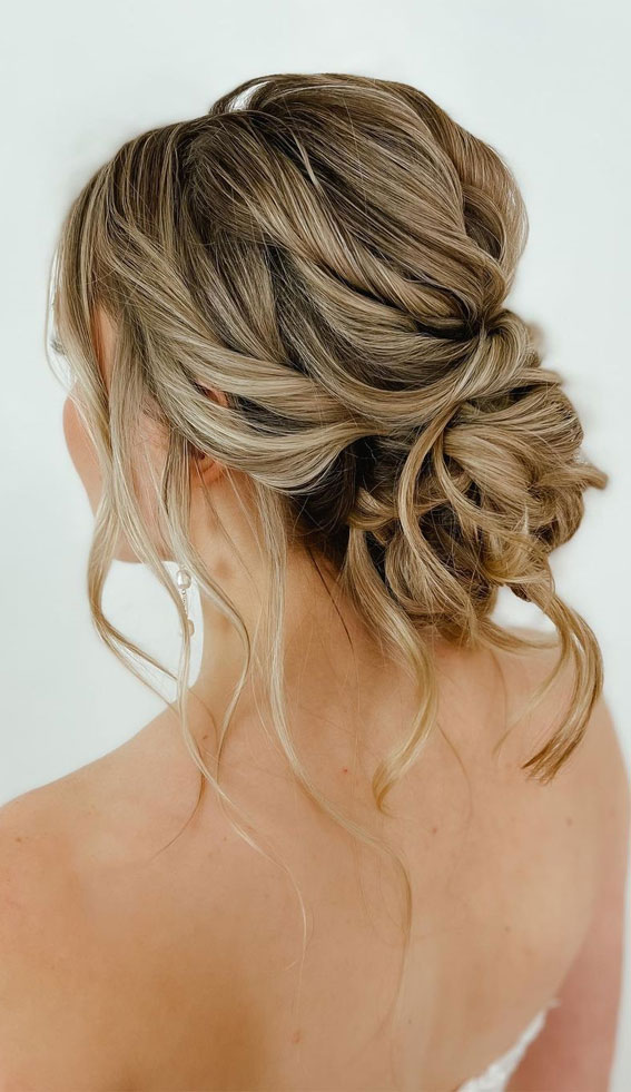 53 Best Wedding Hairstyles for 2023 Brides : Textured Voluminous Boho Bun