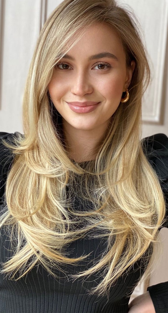 50+ New Haircut Ideas For Women To Try In 2023 : Honey Blonde Layered Cut with Bangs