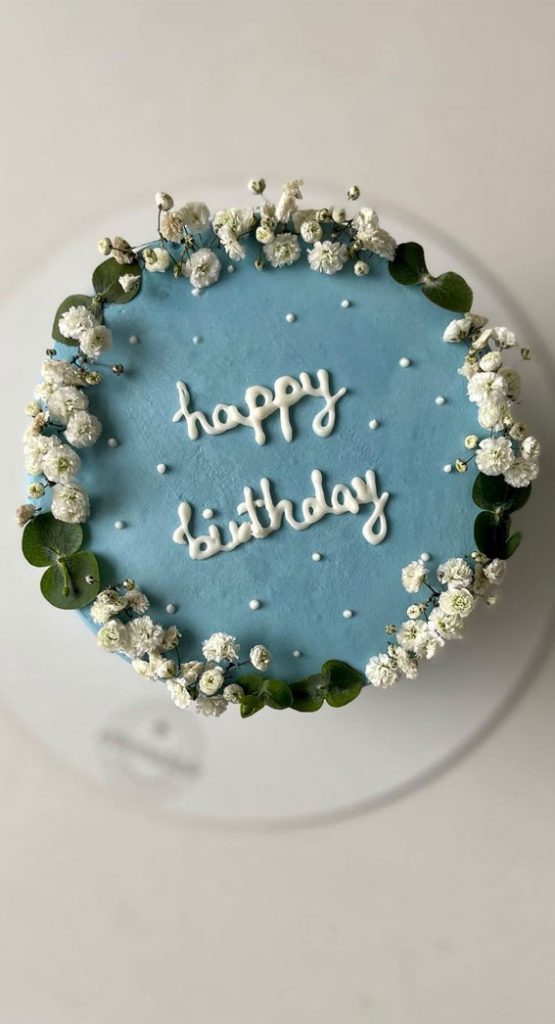 40 Cute Simple Birthday Cake Ideas Round Blue Cake Topped With Flowers   Simple Cake 24 555x1024 