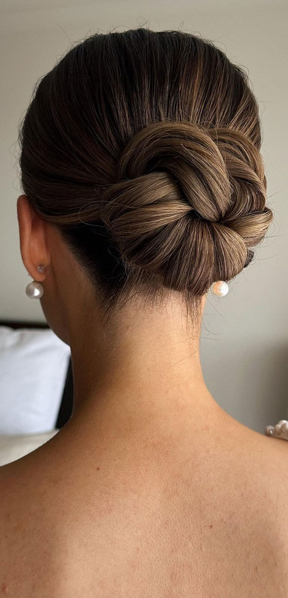 50+ Updo Hairstyles That’re So Stylish : Sleek Knot Low Bun