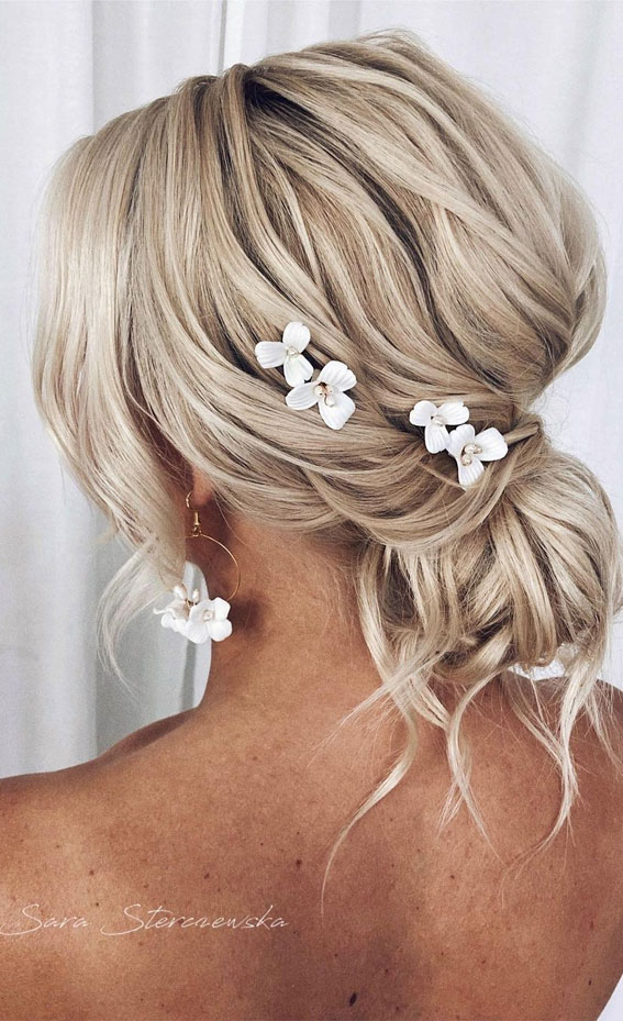 50+ Updo Hairstyles That’re So Stylish : Volume Loose Wave Messy Bun