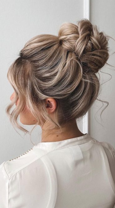 50+ Updo Hairstyles That're So Stylish : High Bun + Face Framing