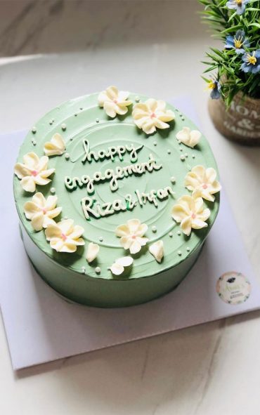 50+cute Minimalist Buttercream Cakes : Light Green Cake Adorned With 