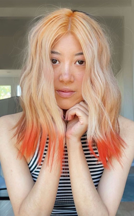 Alluring Hair Colour Ideas for Trendsetters : Textured Blond Bob with Orange Tips