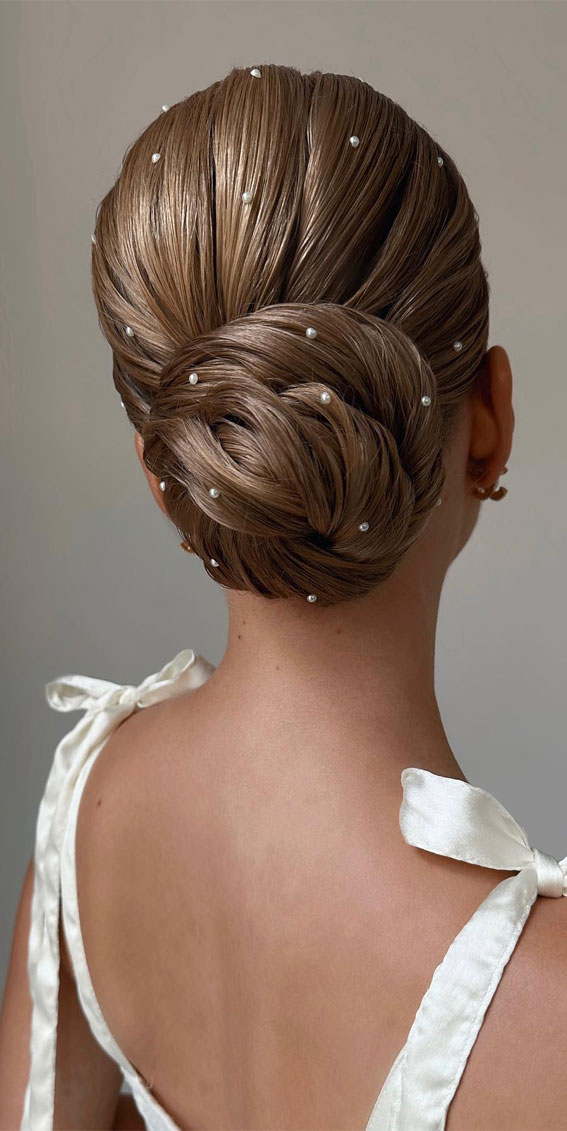 Chic Updos To Elevate Your Hair Game : Sleek Low Bun with Pearls