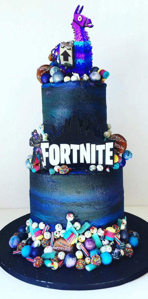 Fortnite Cake Ideas To Inspire You Two Tiered Dark Cake With Lots Of Sweet 3256