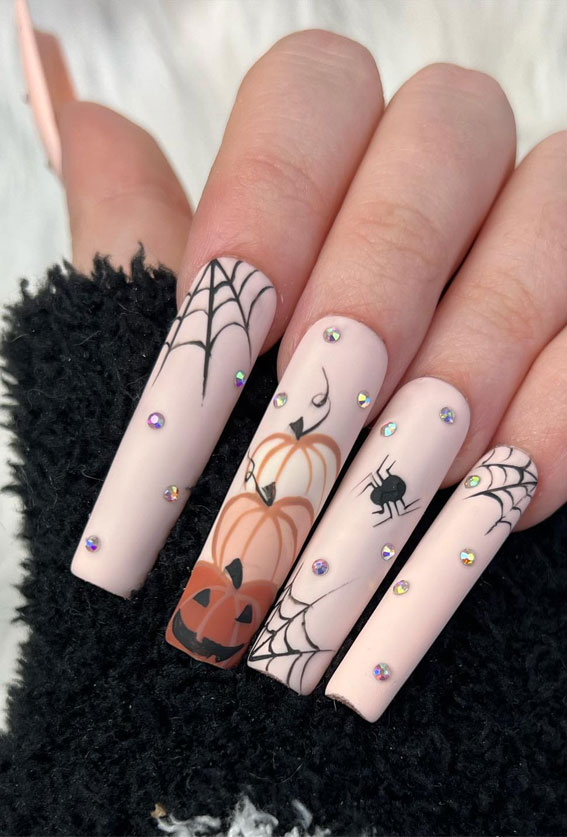 Dazzling Halloween Nails that Turn Heads Spooky Acrylic Nude Nails