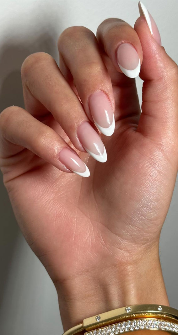 January nails, subtle nails with bow, simple nails, glazed donut nails, french nails, chrome nails, ombre nails, short simple nails, natural nails, nail trends, Chrome tip nails