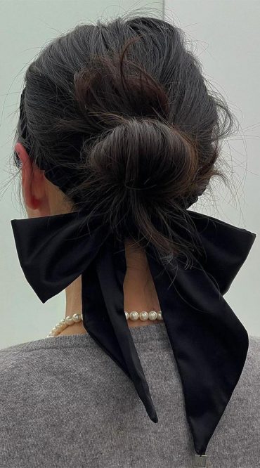 A Trendy Collection of Hairstyles Adorned with Chic Bows : Messy Low ...