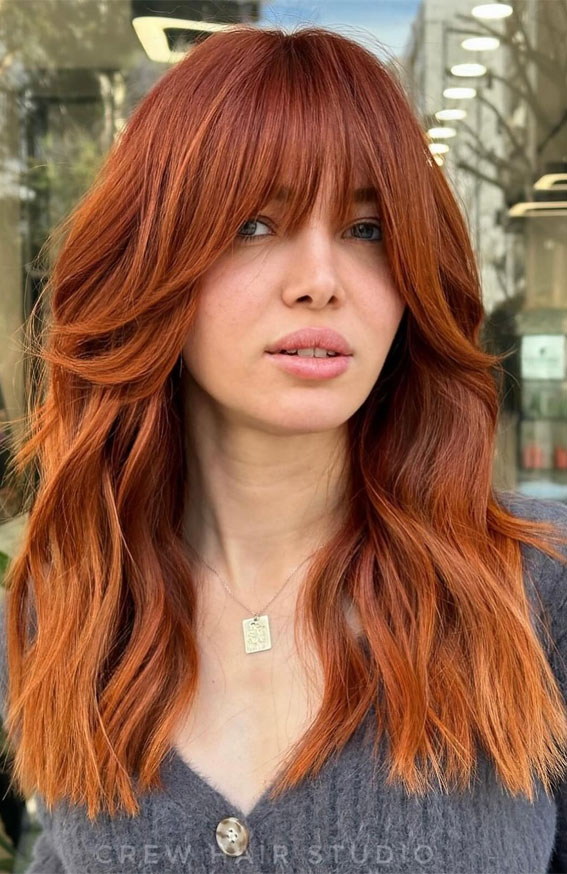 orange copper hair, copper hair with bangs, carrot cake inspired hair color, bright copper hair color