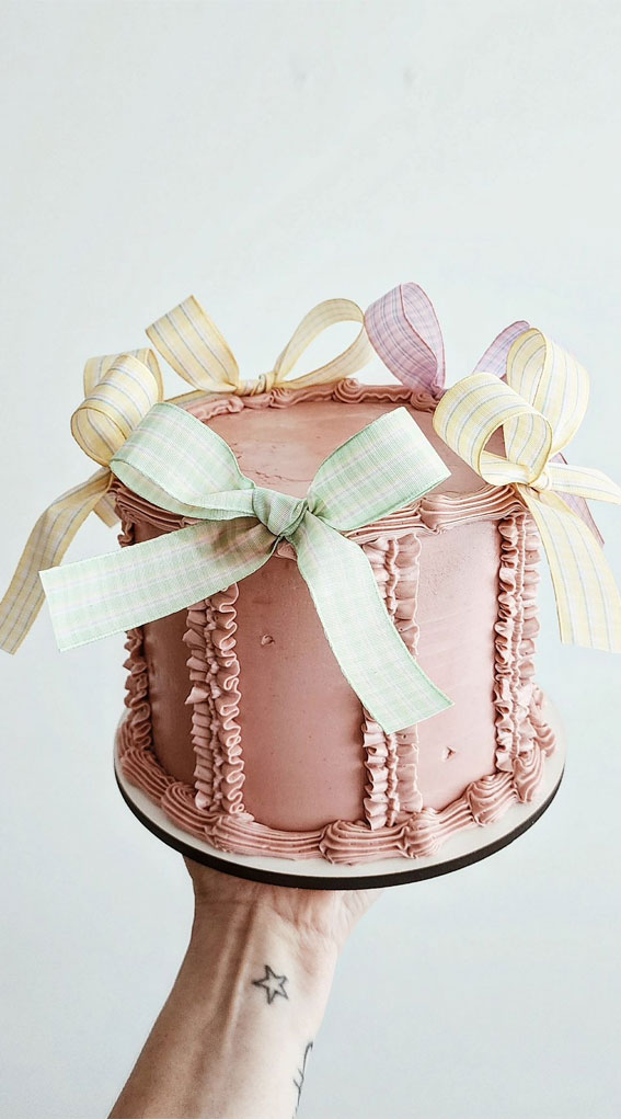 50 Birthday Cake Inspirations For Every Age : Pink Buttercream Cake with Gingham Bows