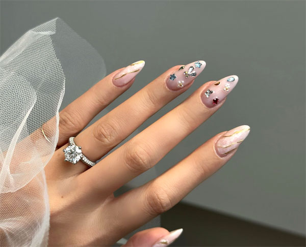 Elegant Embellished Trendy Almond Nail Art with Artistic Vibes