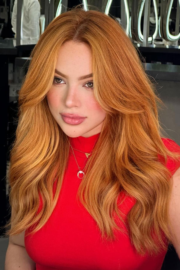 32 Fall Hair Color Trends : Vibrant Ginger Layers with Curtain Bangs