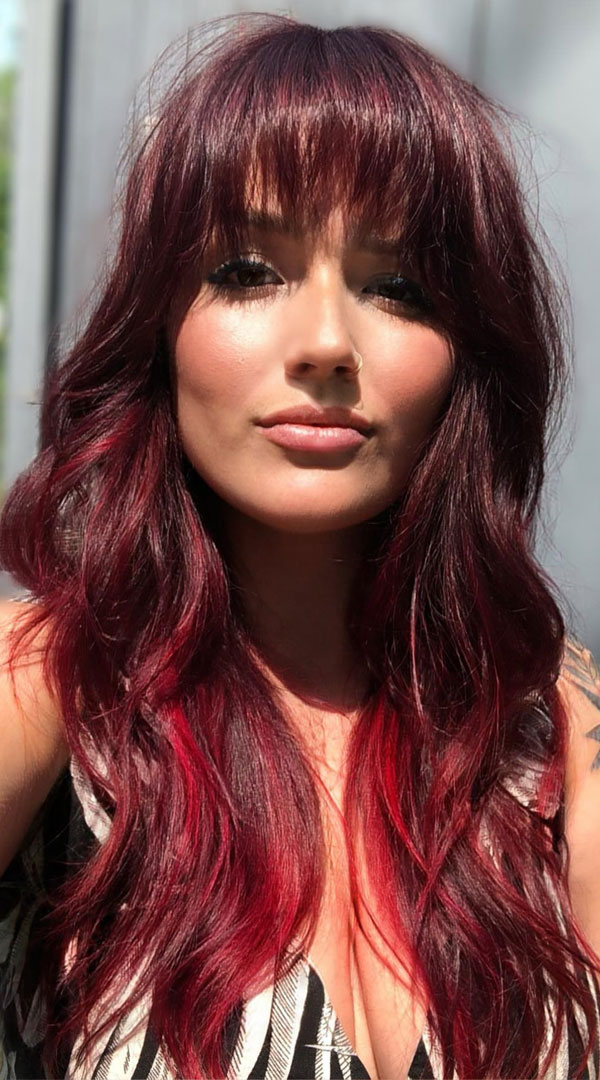 42 Autumn-Inspired Hair Shades to Try : Ruby Red Layers with Fringe