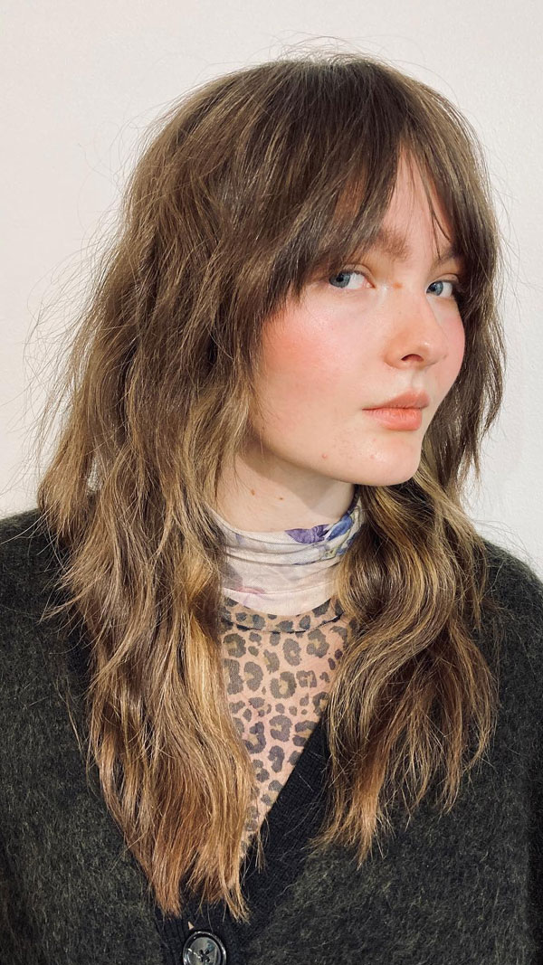 50 Beautiful Long Shag Haircuts for Effortless Style : Effortless Tousled Shag with Wispy Bangs